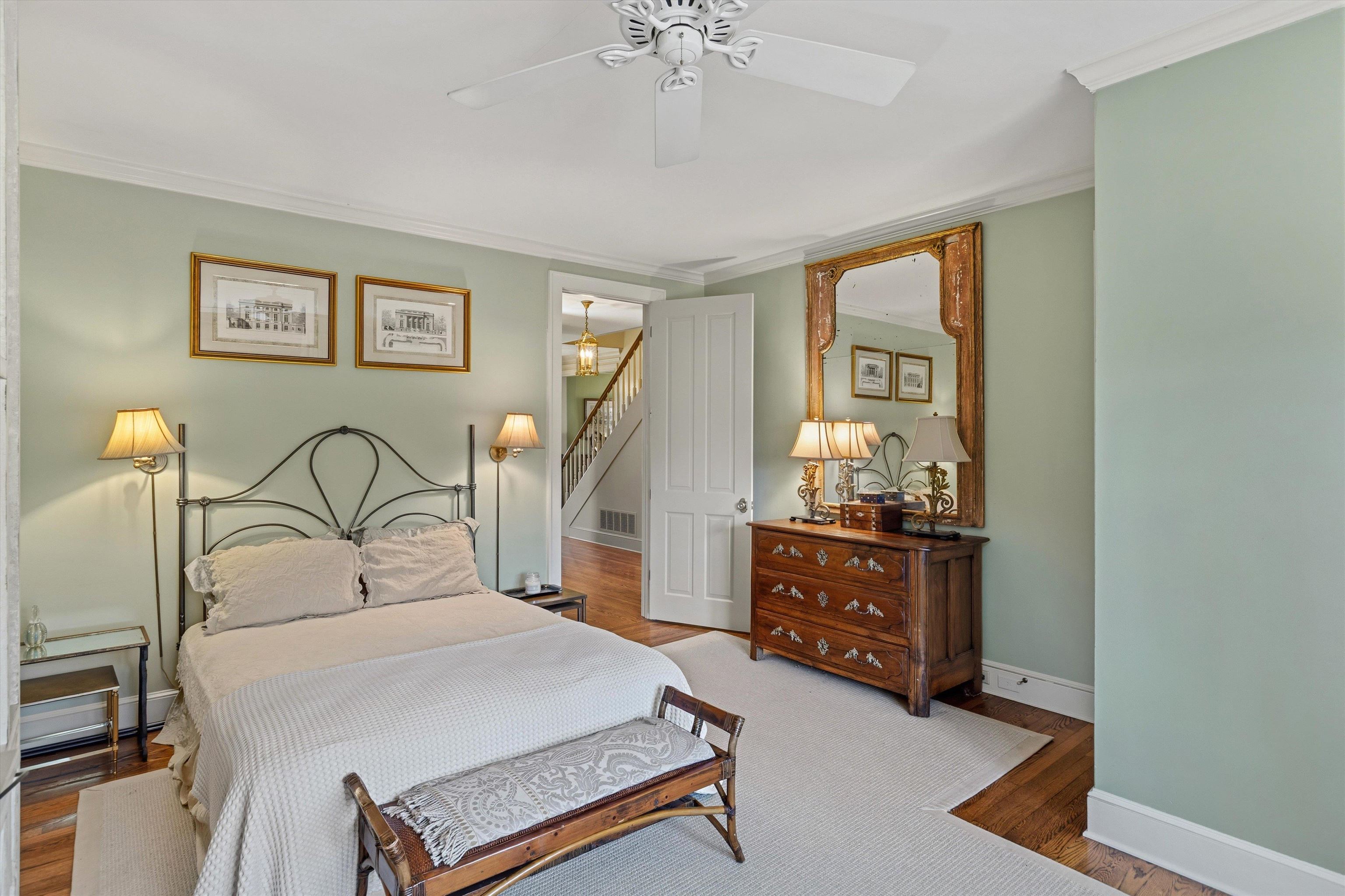 400 Colonial Road Memphis, TN 38117 - Photo 27 of 40 a bedroom with a bed and a chandelier