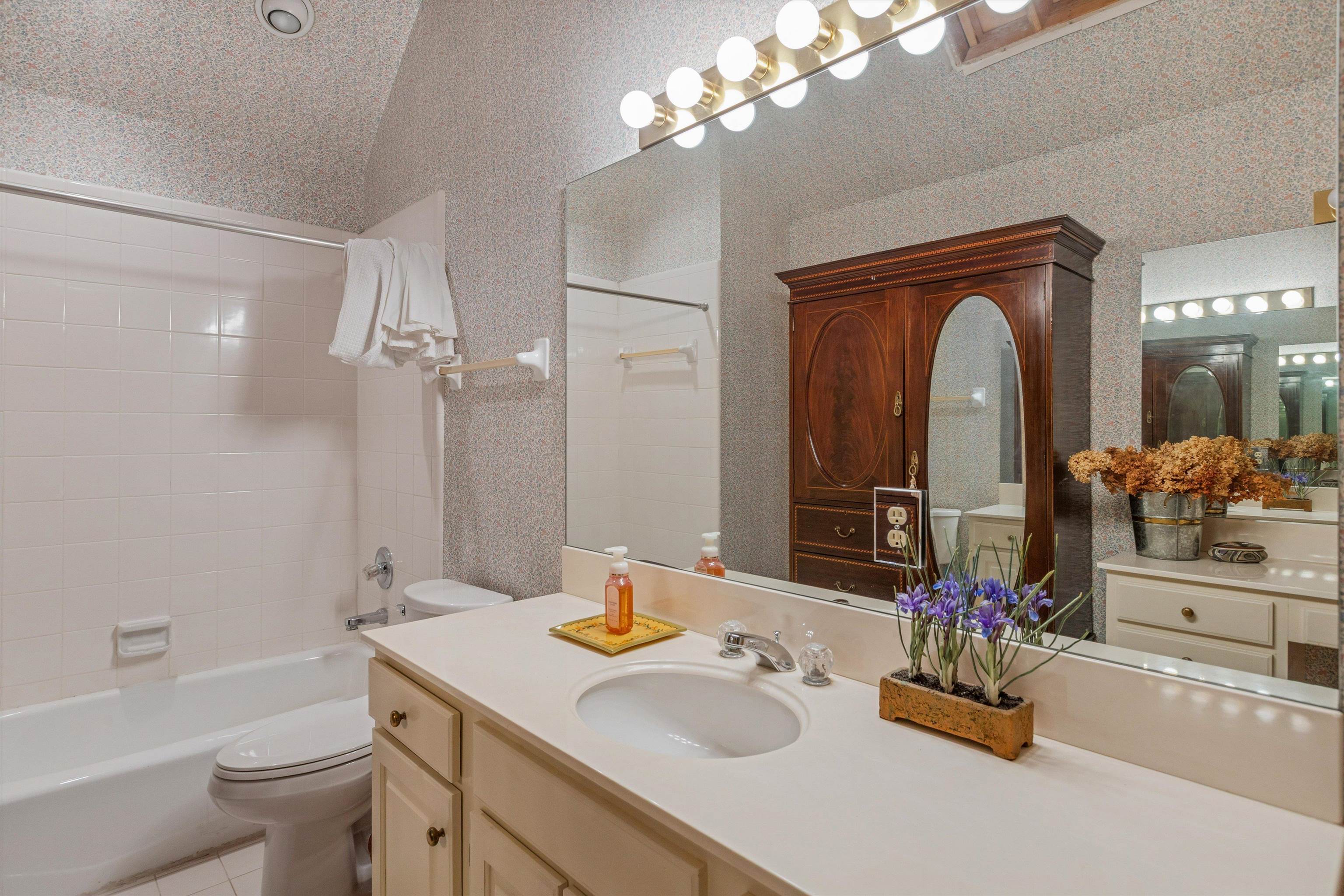 400 Colonial Road Memphis, TN 38117 - Photo 35 of 40 a bathroom with a sink double vanity and a mirror