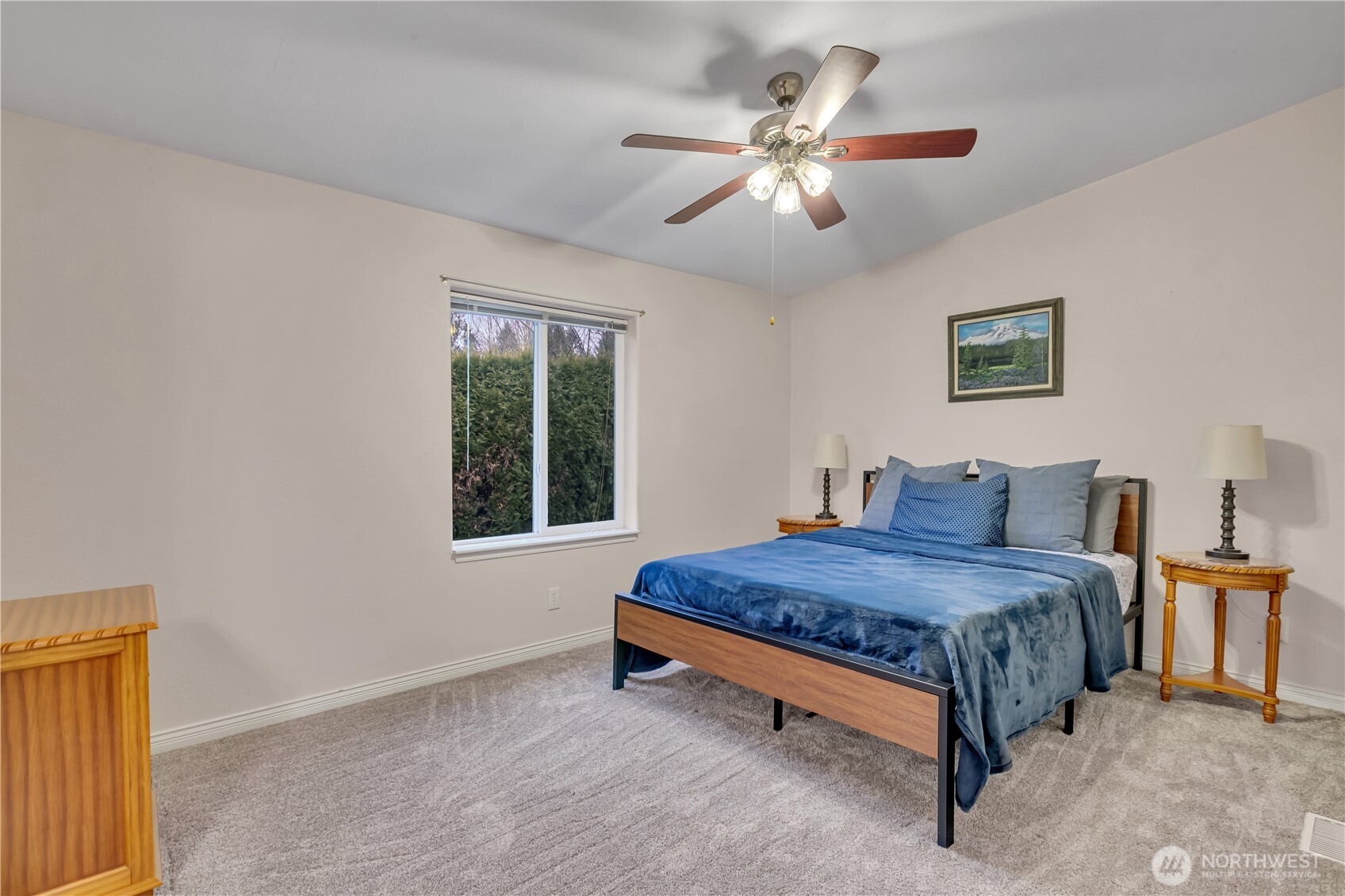 24319 68th Street East, Unit 84 Buckley, WA 98321 - Photo 28 of 40 a bedroom with a bed and window