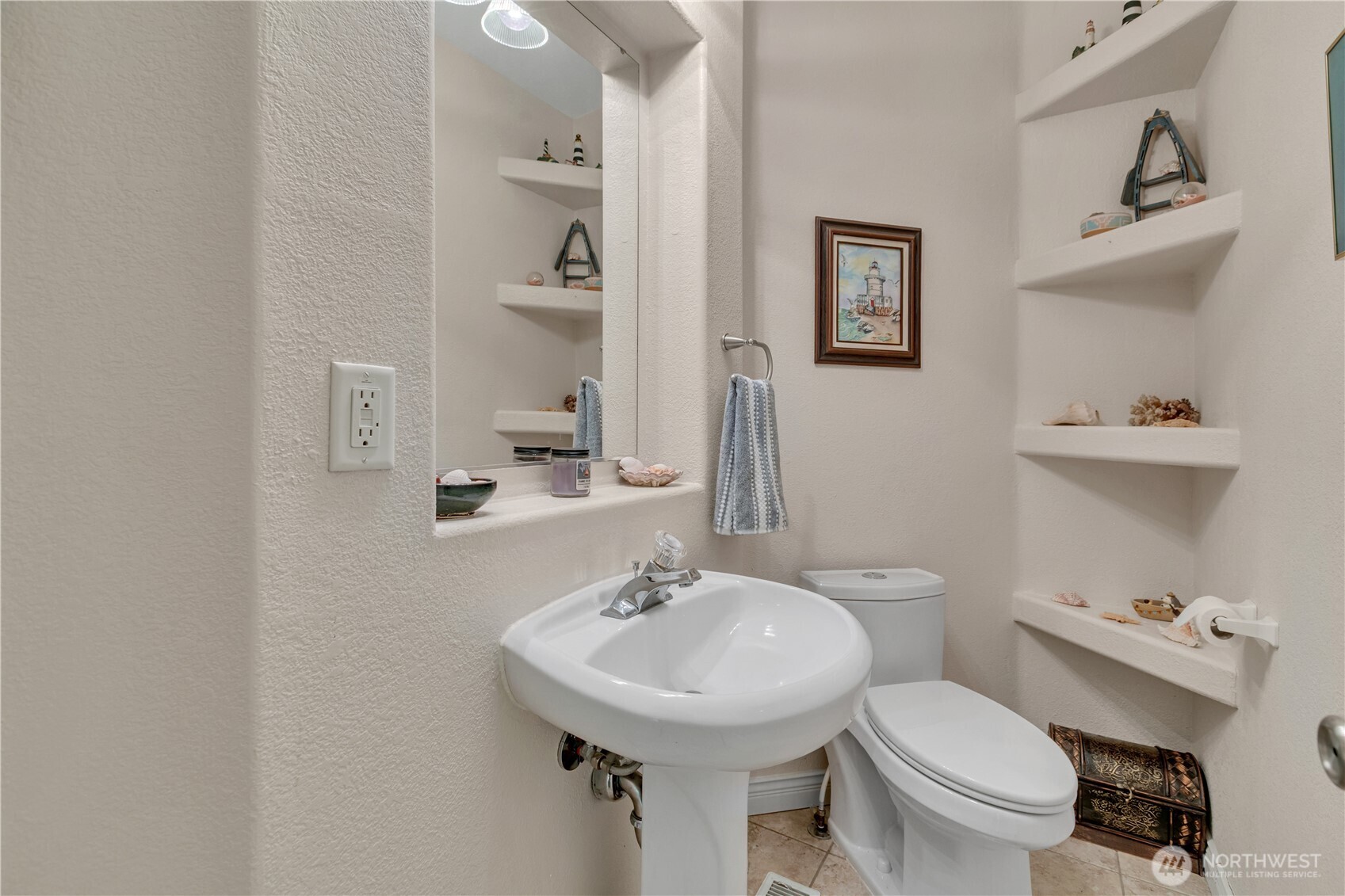 24319 68th Street East, Unit 84 Buckley, WA 98321 - Photo 29 of 40 a bathroom with a sink toilet and a mirror