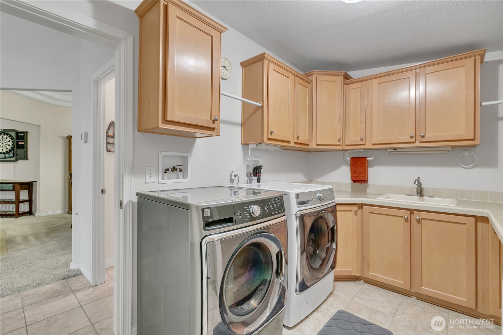 24319 68th Street East, Unit 84 Buckley, WA 98321 - Photo 30 of 40 a view of a kitchen with sink washer and dryer