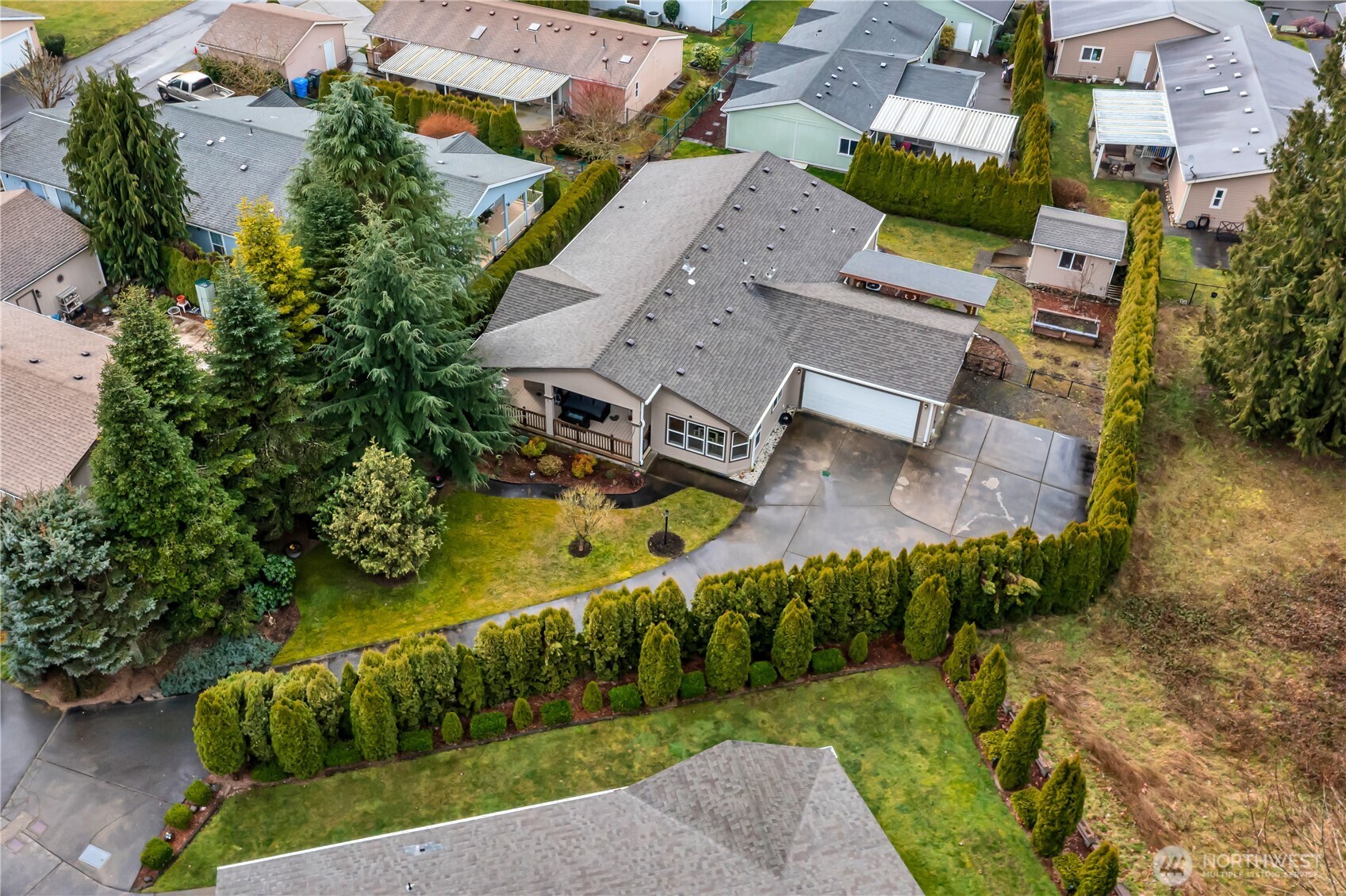 24319 68th Street East, Unit 84 Buckley, WA 98321 - Photo 37 of 40 an aerial view of residential house with outdoor space