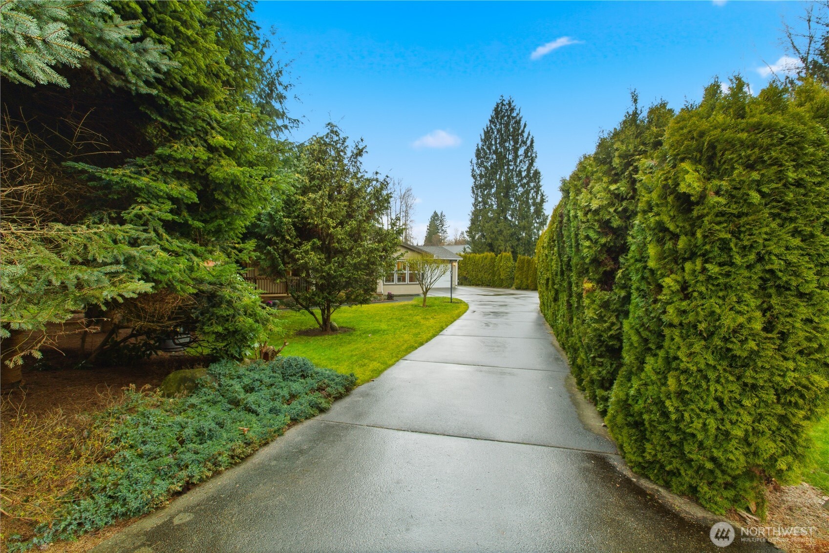 24319 68th Street East, Unit 84 Buckley, WA 98321 - Photo 4 of 40 a view of a pathway both side of the yard