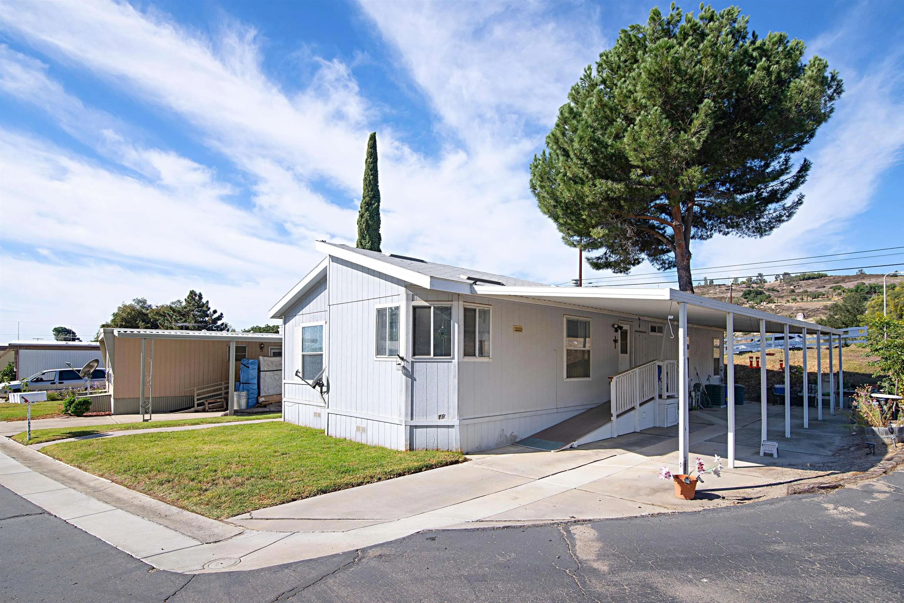 2030 Black Canyon Road, Unit 29 Ramona, CA 92065 - Photo 26 of 36 Ramp at carport entry has been updated. JUNE 2025 new photo to come