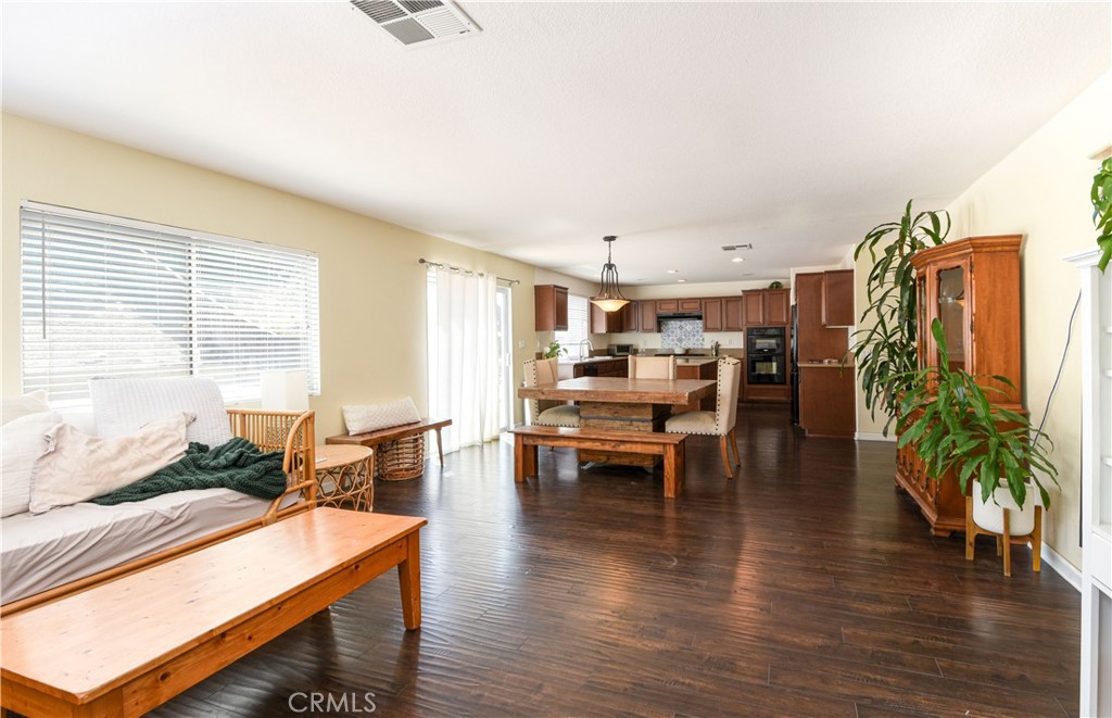 35630 Bryce Road Winchester, CA 92596 - Photo 7 of 32 a living room with furniture and a large window