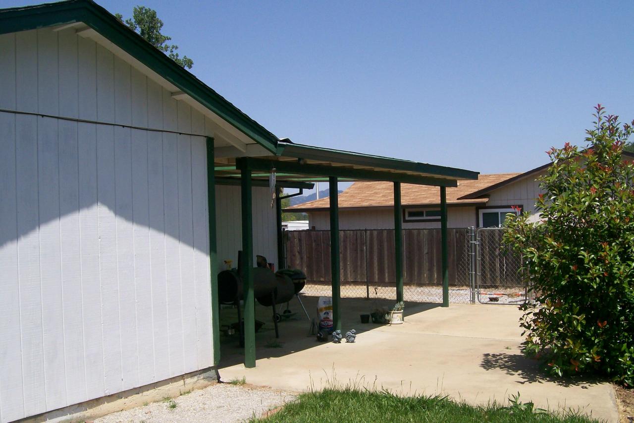 3607 Santa Rosa Way Redding, CA 96003 - Photo 5 of 10 a house view with a backyard space