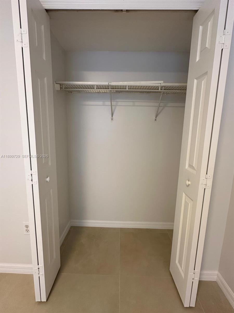 1270 Southeast 28th Court, Unit 101 Homestead, FL 33035 - Photo 24 of 27 a view of closet