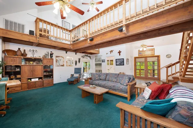 a kitchen with stainless steel appliances granite countertop a sink and refrigerator