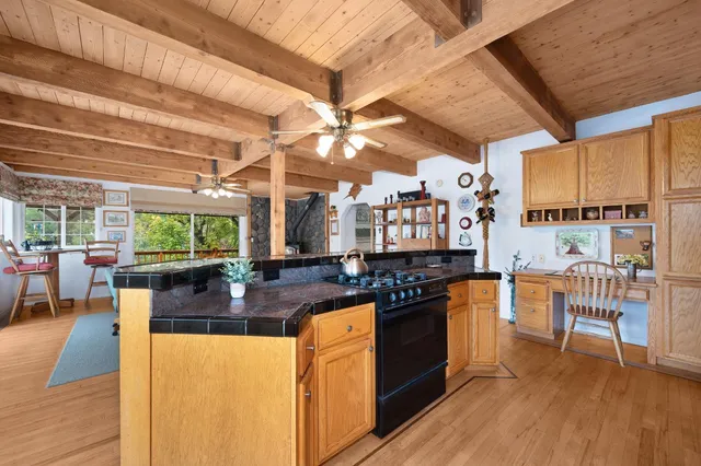 a bathroom with a toilet a sink and a mirror