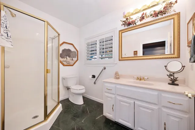 a living room with furniture and a yard