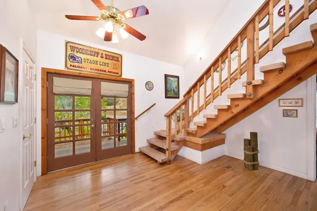 a bathroom with a shower curtain and a sink