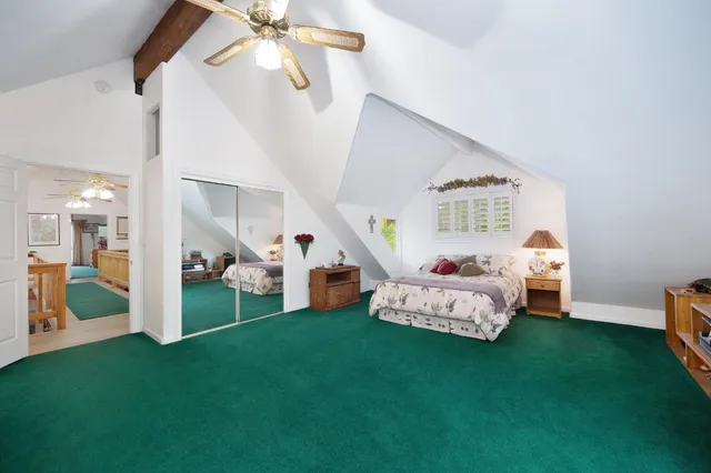 a bathroom with a bath tub and shower