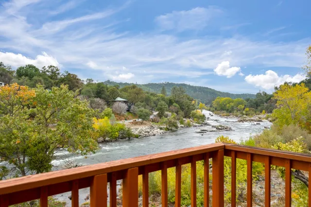 front view of house with a trees