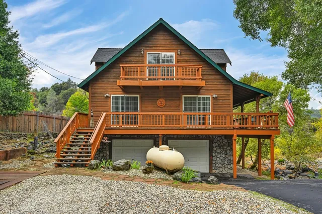 a view of a porch with wooden floor