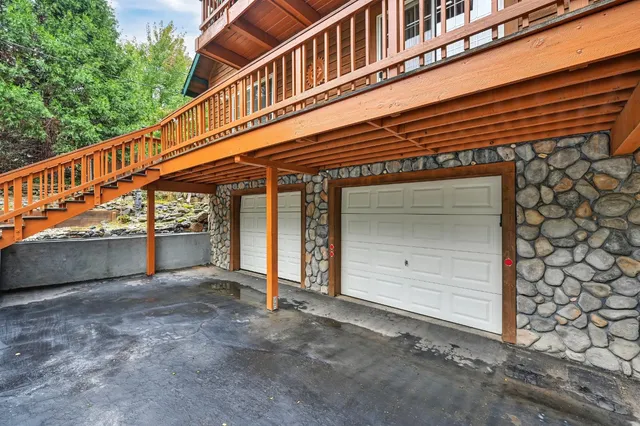 a view of a porch with wooden floor