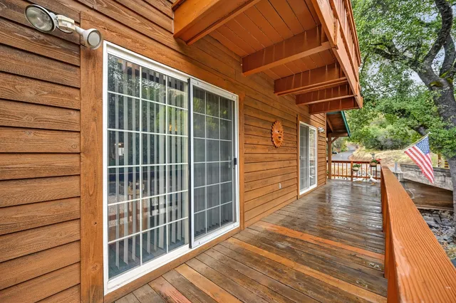 a view of an entryway with a bench