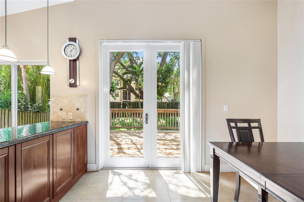 1443 Banyan Circle Pompano Beach, FL 33069 - Photo 11 of 36 a view of a hallway with interior of the house