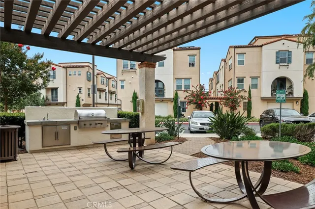 a view of a chairs and tables in the patio