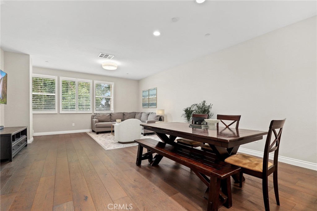649 West Foothill Boulevard, Unit 2 Glendora, CA 91741 - Photo 6 of 44 a living room with furniture and a floor to ceiling window