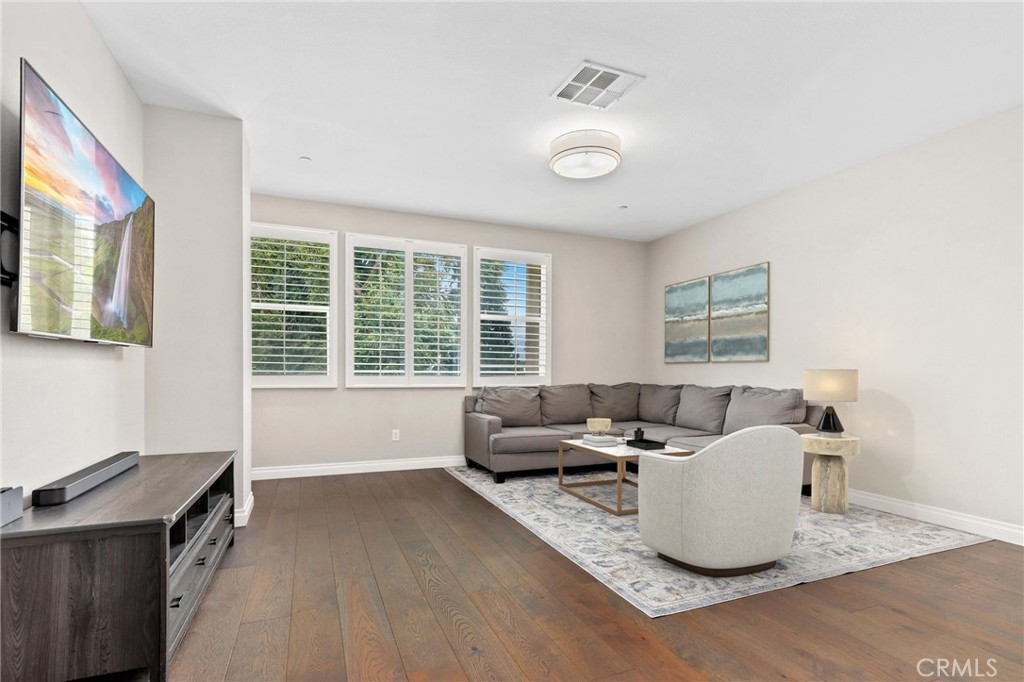 649 West Foothill Boulevard, Unit 2 Glendora, CA 91741 - Photo 10 of 44 a living room with furniture and a window