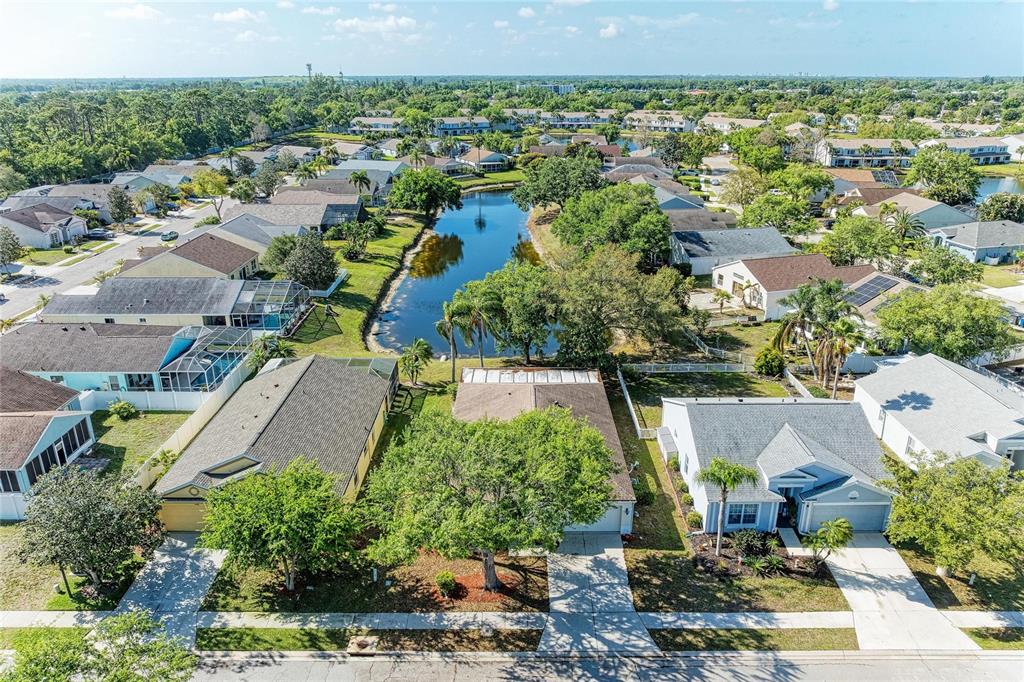 4642 Runabout Way Bradenton, FL 34203 - Photo 2 of 66 an aerial view of residential houses with outdoor space and swimming pool