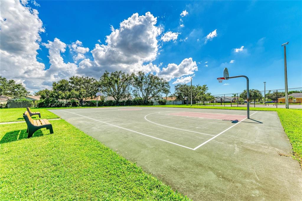 4642 Runabout Way Bradenton, FL 34203 - Photo 66 of 66 a view of a playground with basketball court