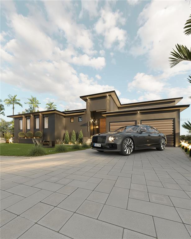16376 Perico Way Punta Gorda, FL 33955 - Photo 8 of 24 a view of a car in front of a house