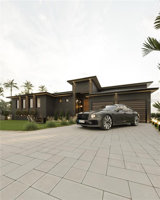 16376 Perico Way Punta Gorda, FL 33955 - Photo 9 of 24 a view of a car parked in front of a house