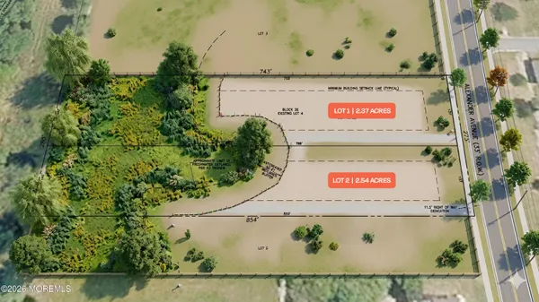 an aerial view of residential houses with outdoor space and trees all around