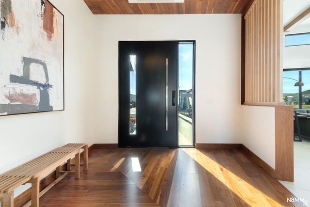 3607 South Cypress Pt Road Hurricane, UT 84737 - Photo 12 of 59 Grand entryway featuring dark wood finished floors, and healthy amount of natural light