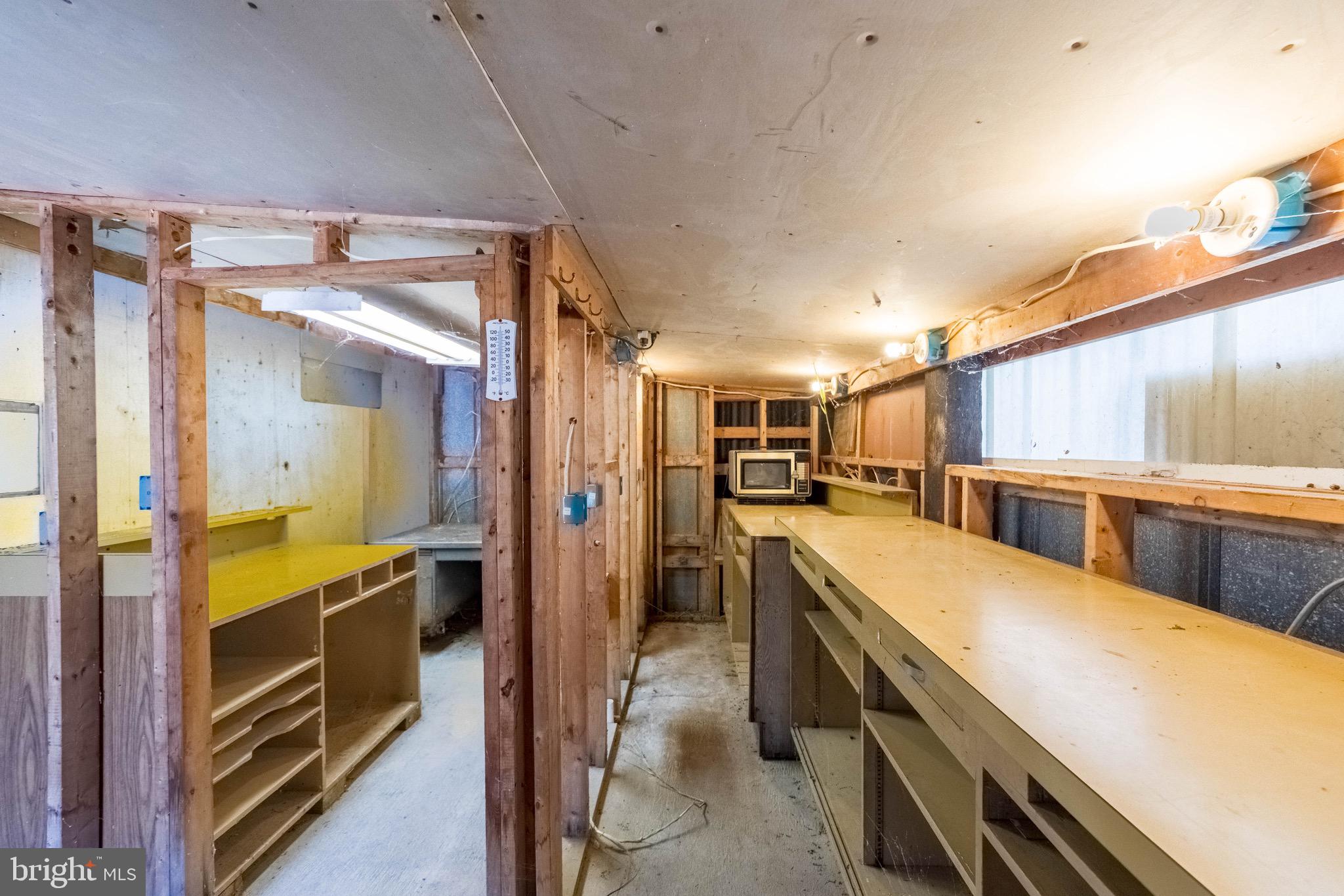 27020 Oriole Road Princess Anne, MD 21853 - Photo 13 of 24 a view of a kitchen cabinets and a counter place