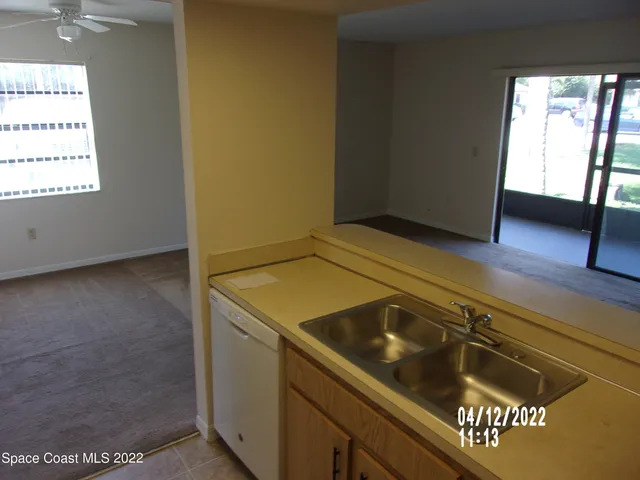 a bathroom with a glass door shower