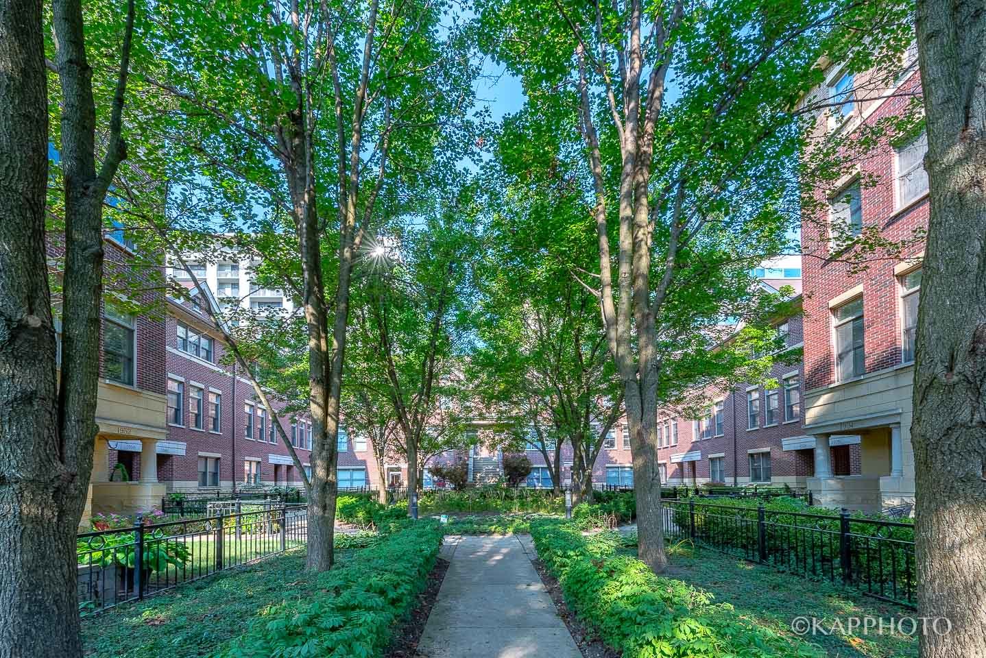 1942 South Prairie Avenue, Unit 3 Chicago, IL 60616 - Photo 1 of 13 a view of a building with a yard