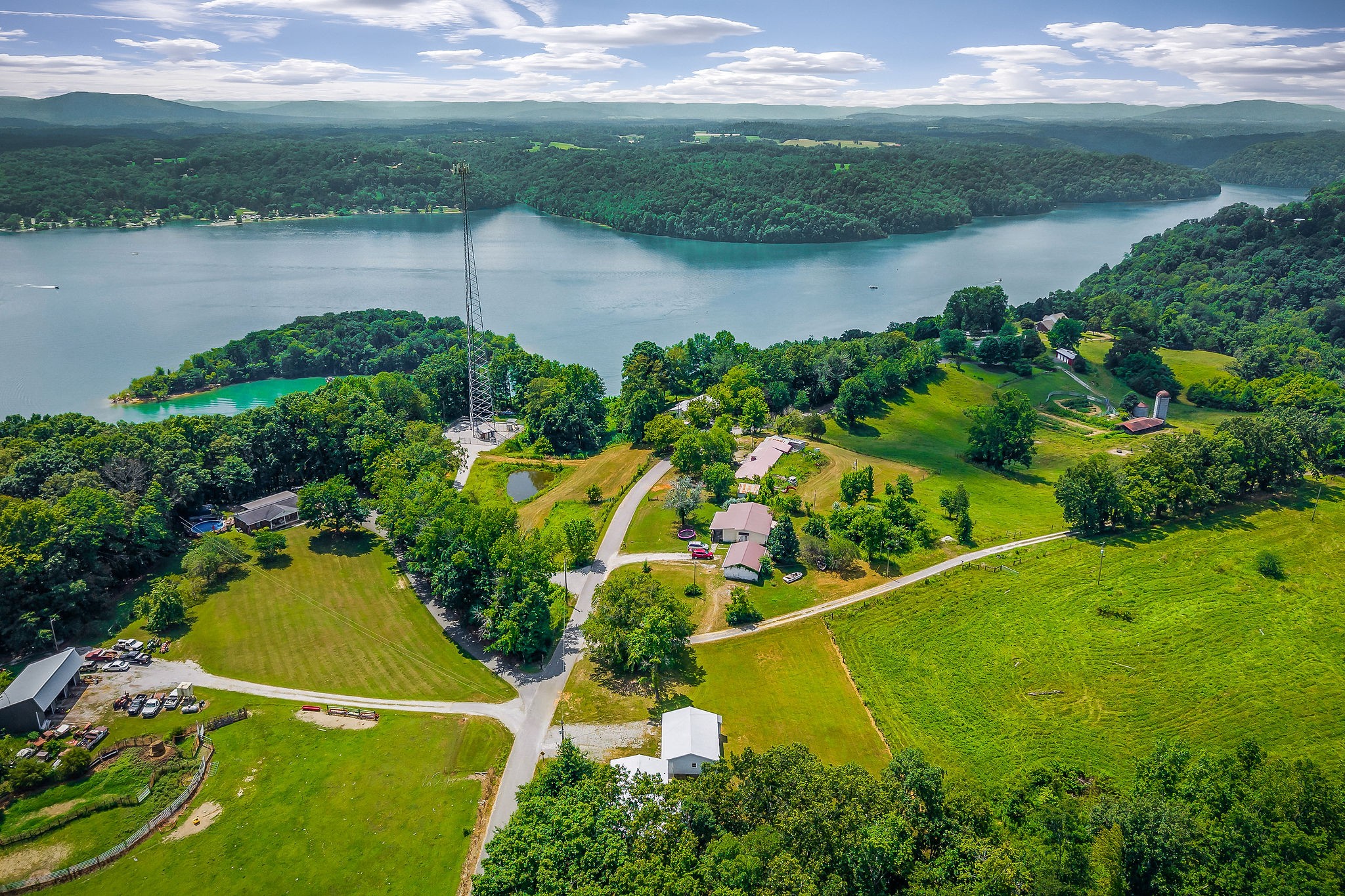 572 Lakeside Road Byrdstown, TN 38549 - Photo 11 of 44 an aerial view of a residential houses with outdoor space and a lake view