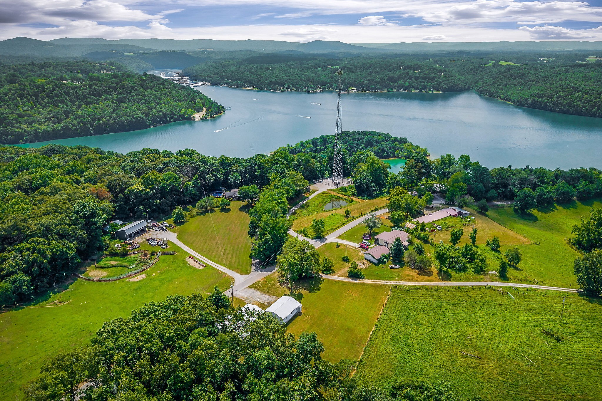 572 Lakeside Road Byrdstown, TN 38549 - Photo 12 of 44 an aerial view of a residential houses with outdoor space and a lake view