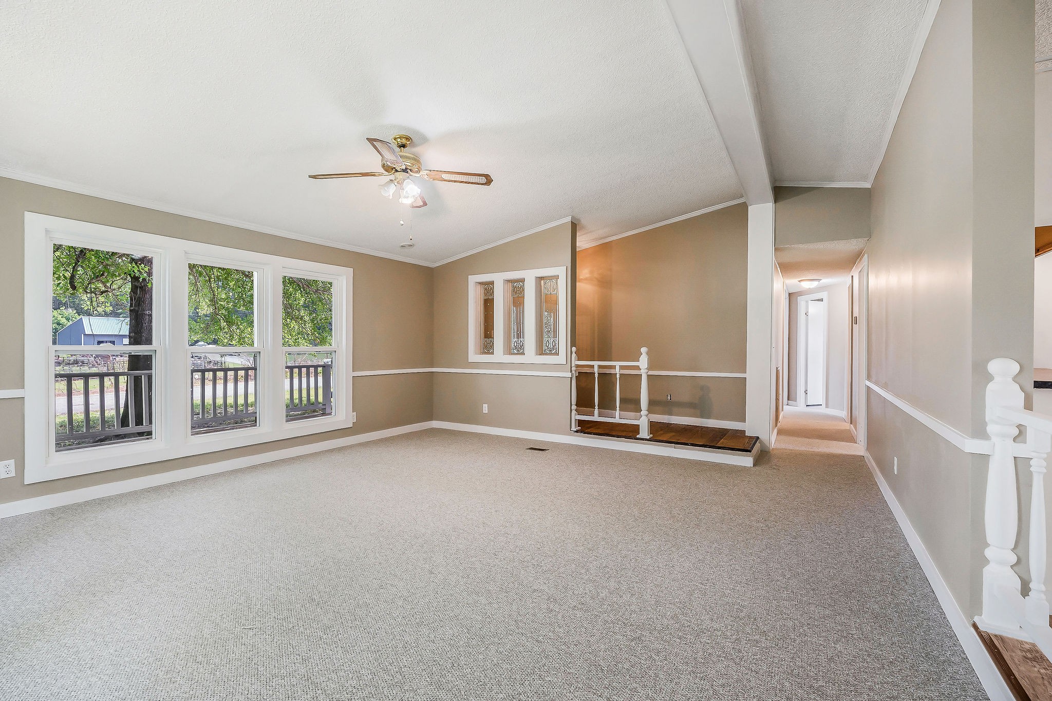572 Lakeside Road Byrdstown, TN 38549 - Photo 15 of 44 an empty room with a empty space and windows