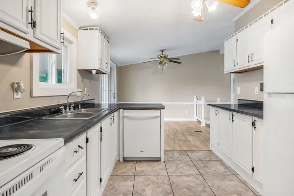 a view of cabinets and wooden floor