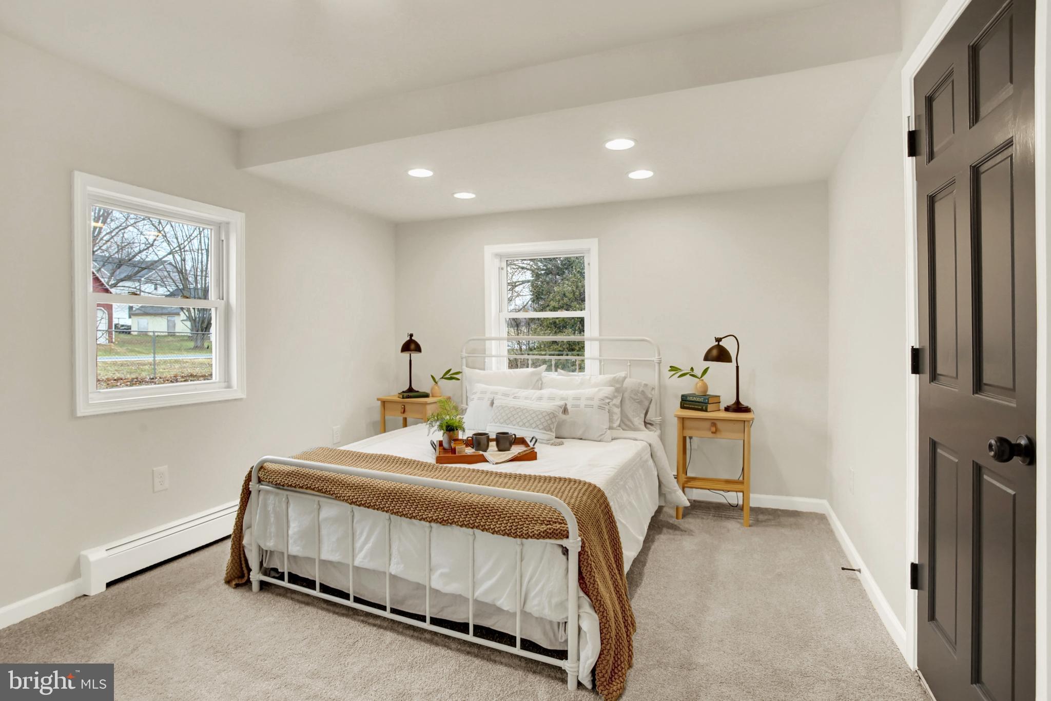 507 Magaro Road Enola, PA 17025 - Photo 12 of 35 a bedroom with a bed and a painting on the wall