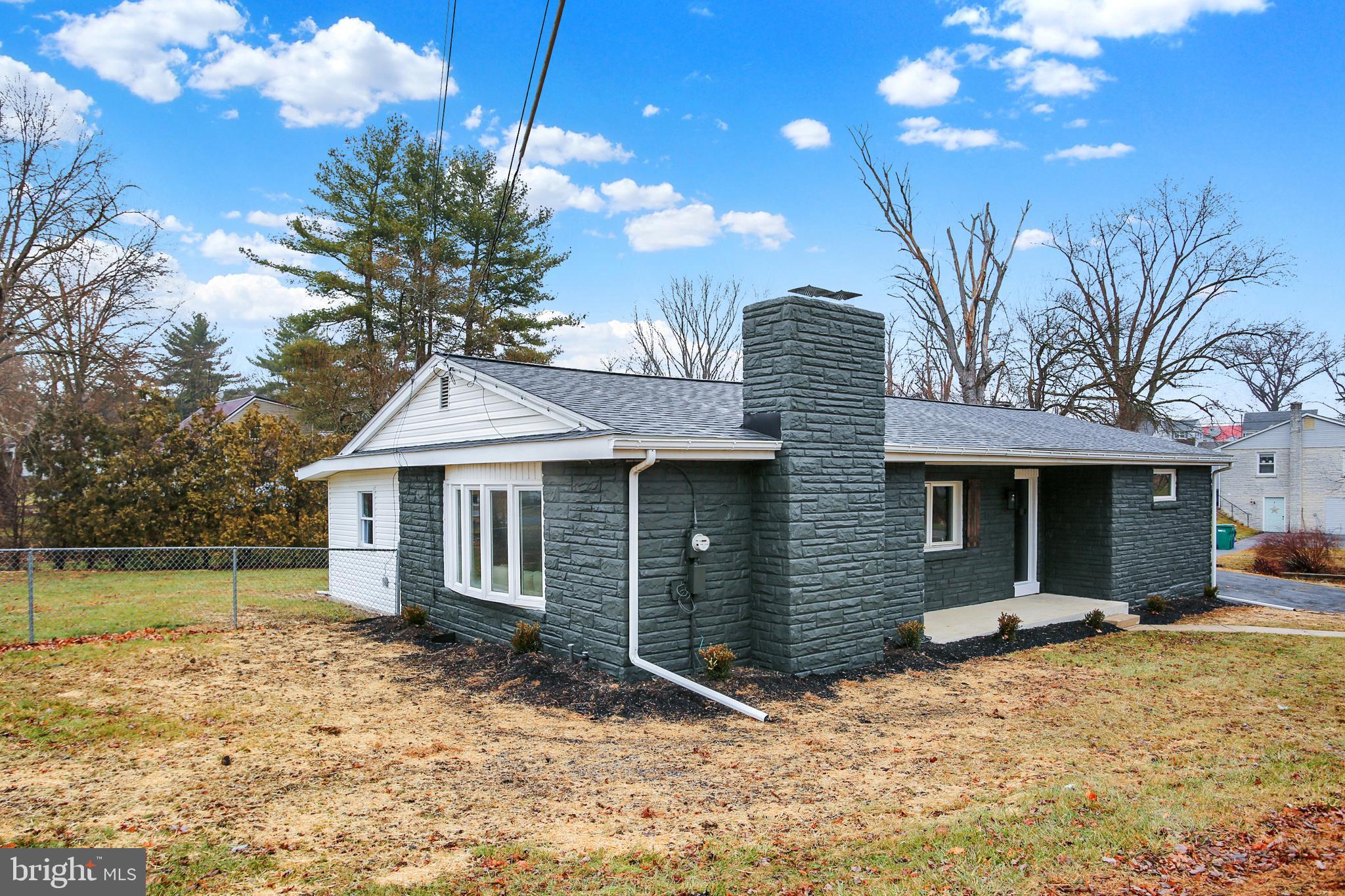 507 Magaro Road Enola, PA 17025 - Photo 32 of 35 a front view of a house with a yard and garage