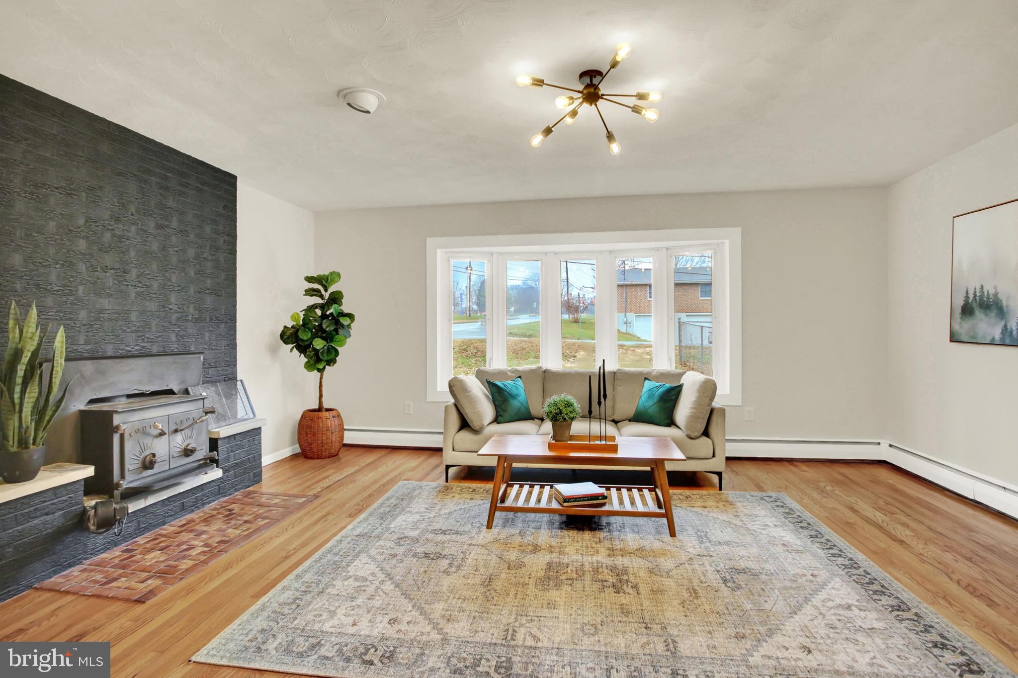 507 Magaro Road Enola, PA 17025 - Photo 6 of 35 a living room with furniture and a potted plant
