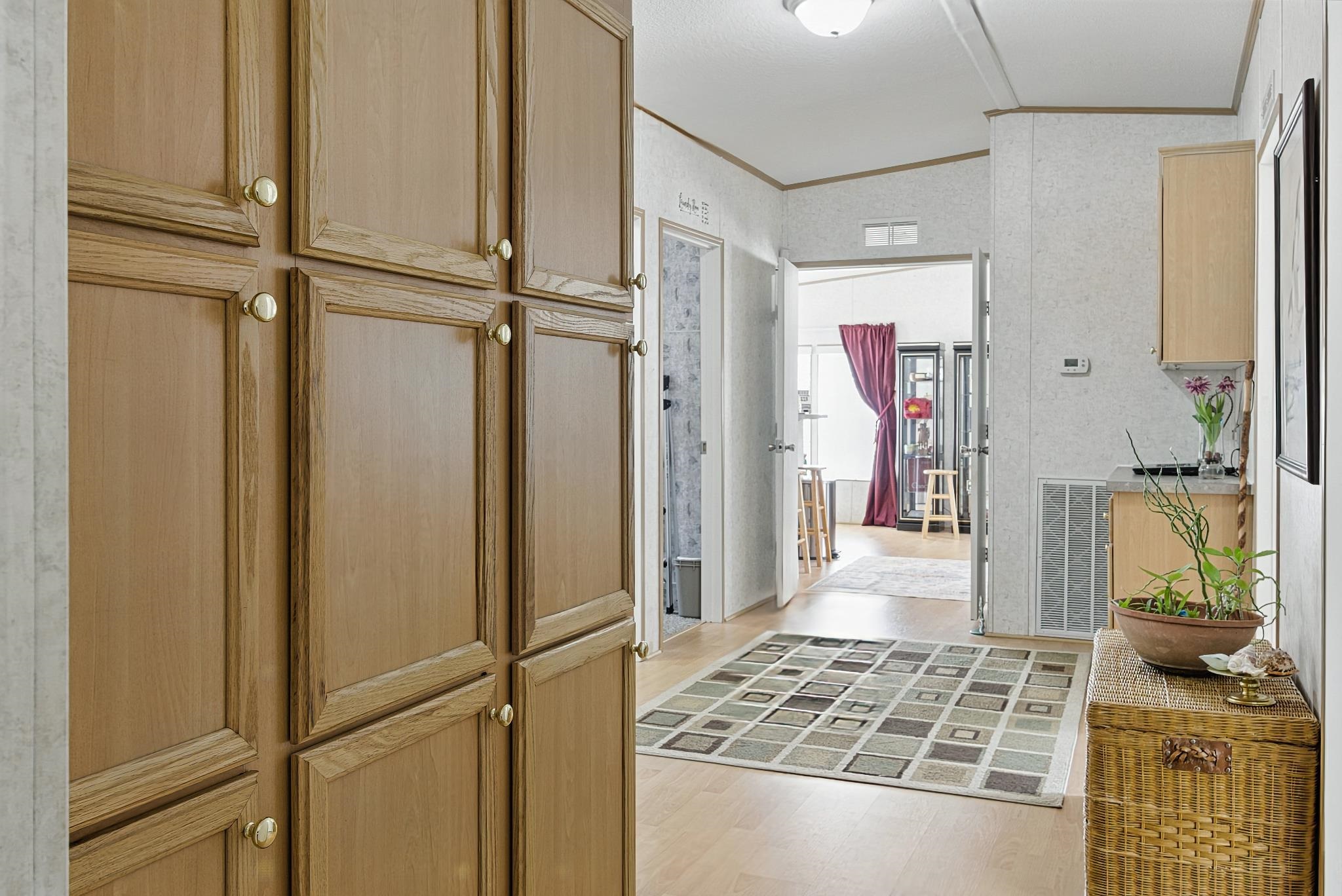 2257 Whippoorwill Drive St. Augustine, FL 32084 - Photo 22 of 50 a view of a bedroom with wooden floor and windows