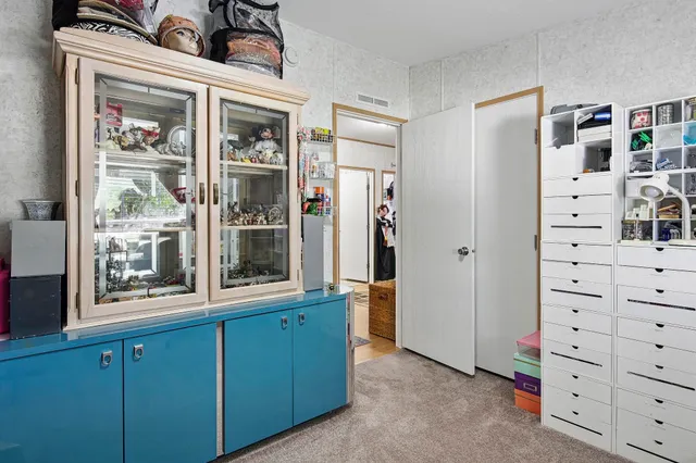 a children room with toys and a couch