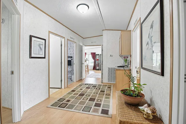 a bathroom with a granite countertop sink and a white cabinet