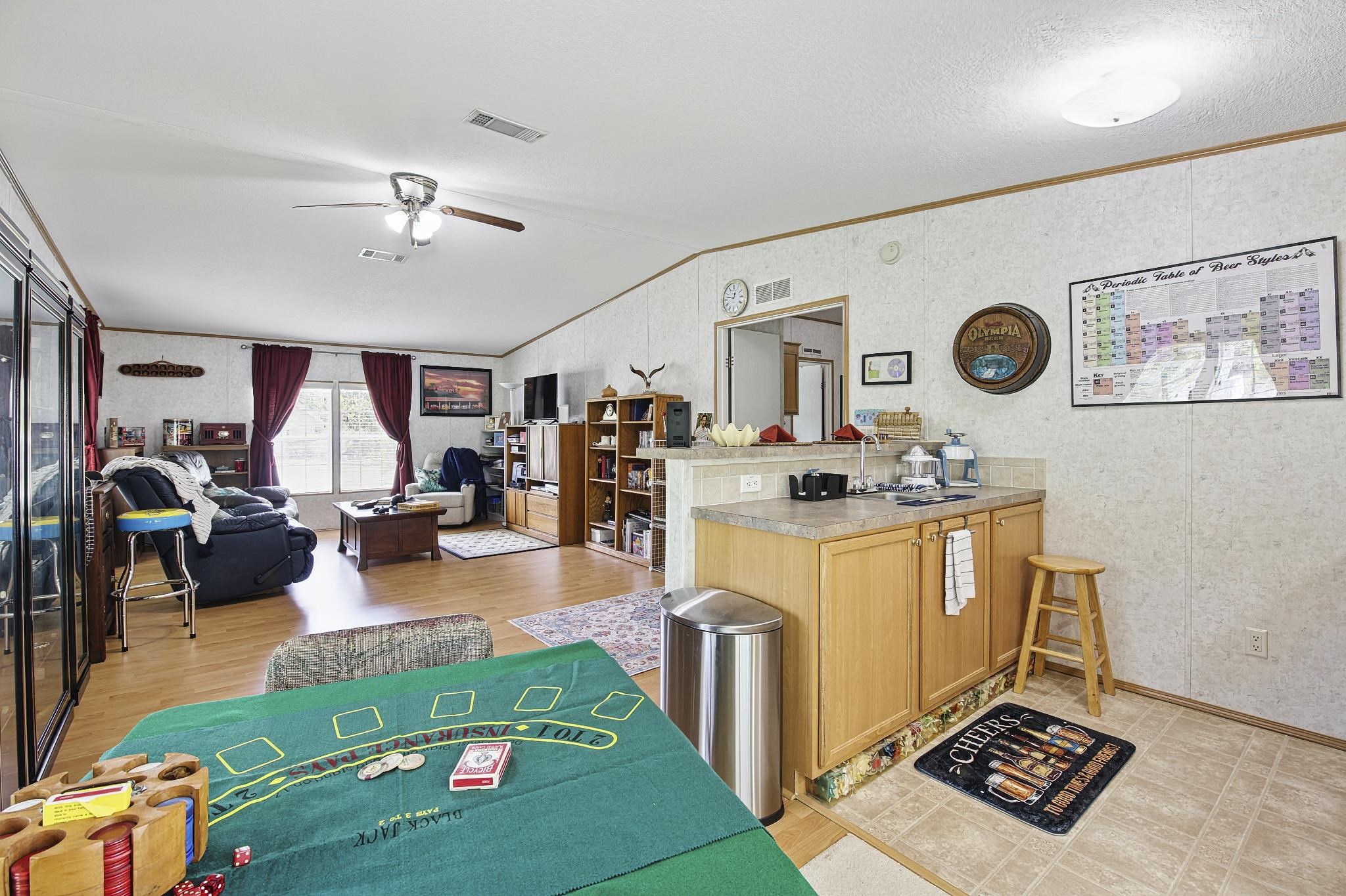 2257 Whippoorwill Drive St. Augustine, FL 32084 - Photo 32 of 50 a living room with furniture and a clock