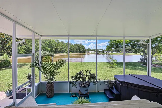 a view of a patio in the backyard