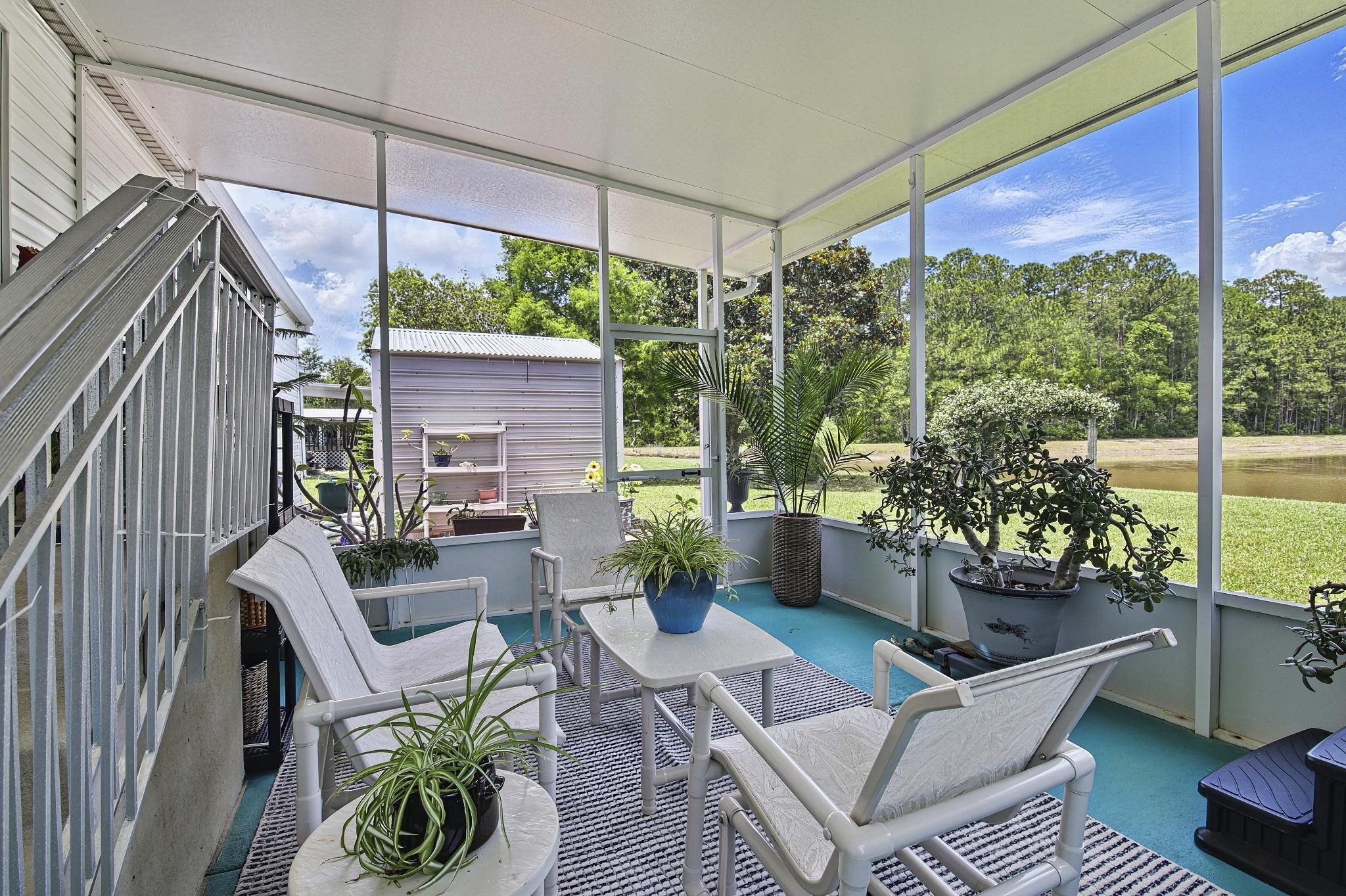 2257 Whippoorwill Drive St. Augustine, FL 32084 - Photo 40 of 50 a view of a patio in the backyard