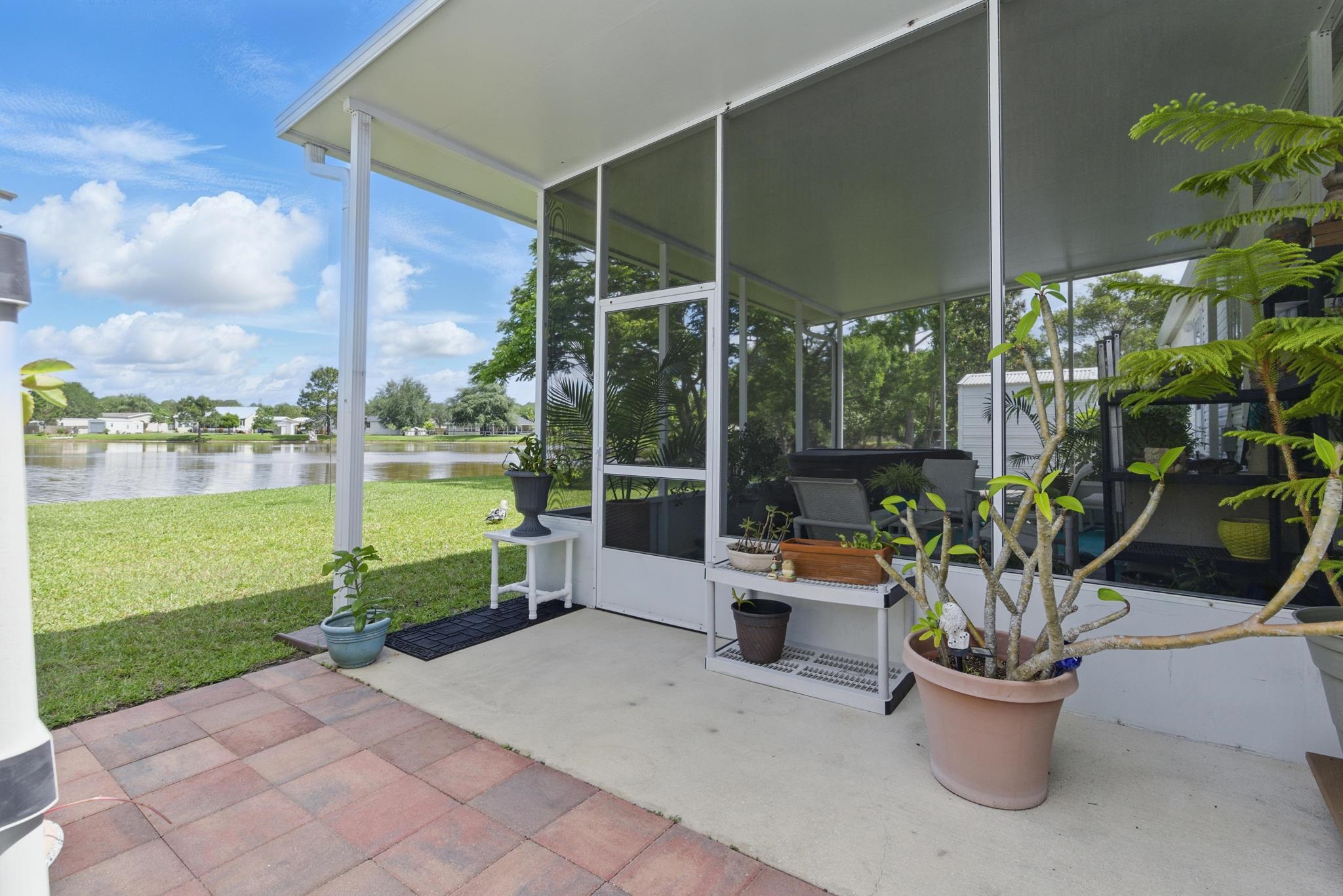 2257 Whippoorwill Drive St. Augustine, FL 32084 - Photo 43 of 50 a view of a porch with garden