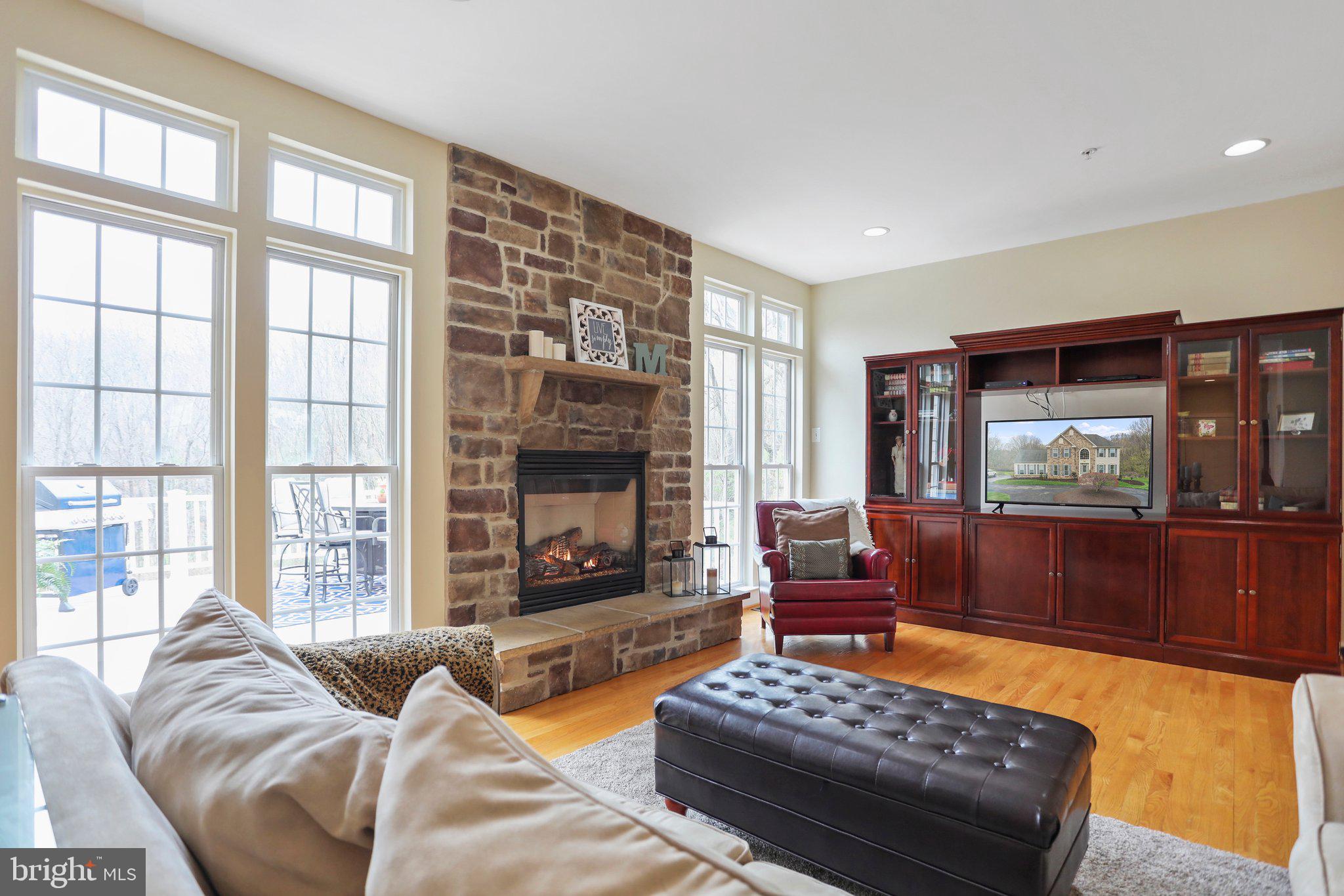 20900 Clarksburg Road Boyds, MD 20841 - Photo 15 of 68 Stone Fireplace in Family Room