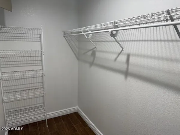 a view of a room with racks on the wall
