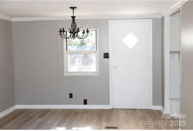 a view of a chandelier in a room